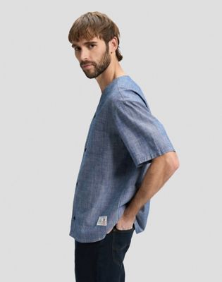 Relaxed Baseball Tee With Pocket in Light Wash Chambray