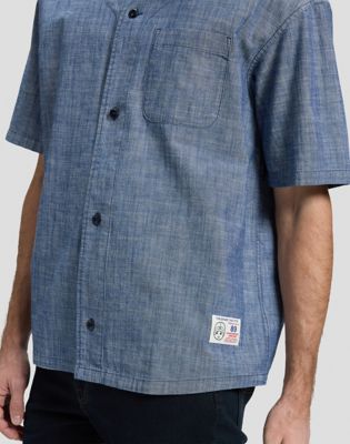 Relaxed Baseball Tee With Pocket in Light Wash Chambray