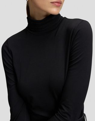 Slim Long Sleeve Turtleneck Top in Black